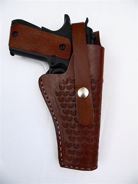 We make leather holsters for Wilson Combat, Dan Wesson, Kimber, Nighthawk Custom, STI, Les Baer, Ed Brown, and Colt. . Free 1911 leather holster pattern